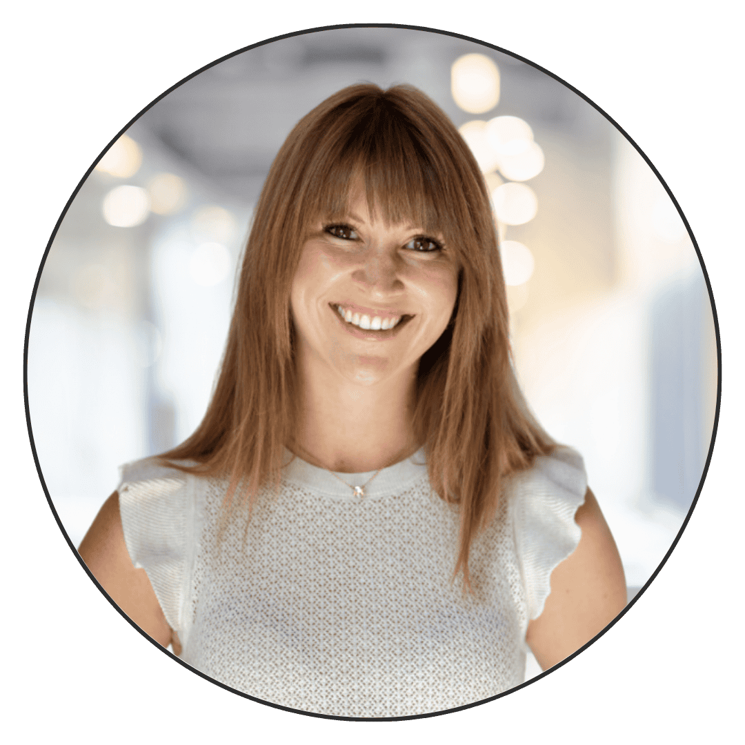 Experienced woman smiling in modern home environment.