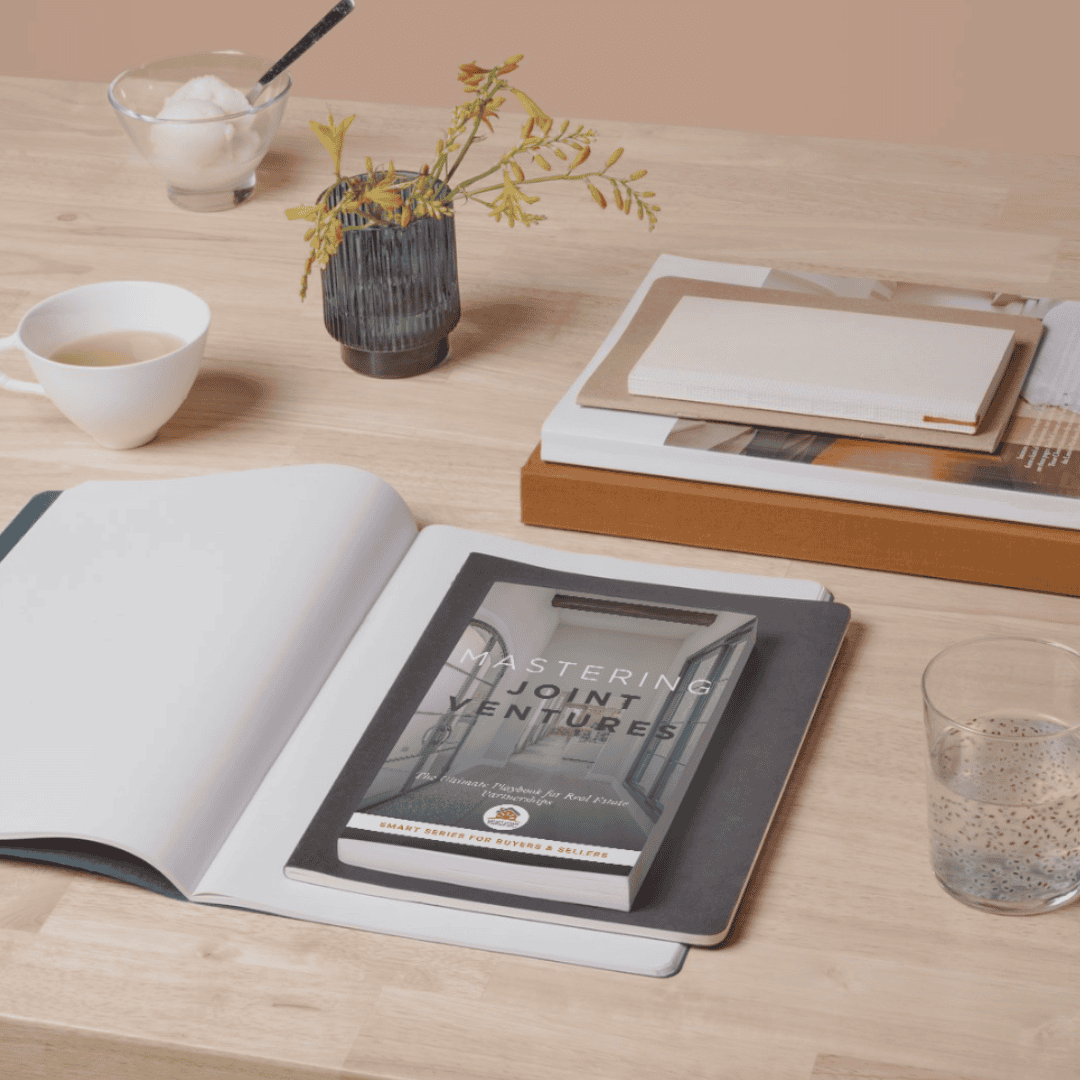 Modern home office with real estate book on investing tips.