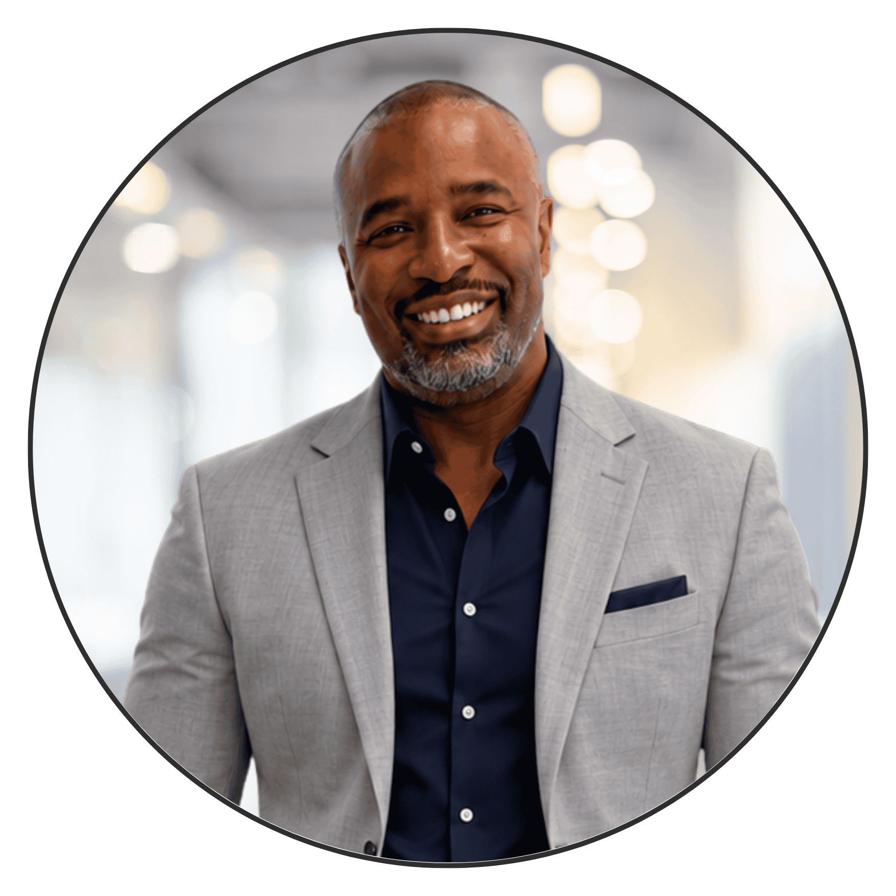 Smiling man in a gray suit for real estate investing.